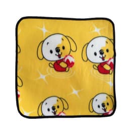 A yellow picnic seat mat featuring a playful pattern of dogs holding balls, edged in black.