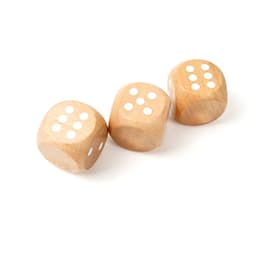 Three custom blank wooden dice with white dots on a light wooden surface.