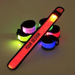 A vibrant LED slap bracelet in red, with several glowing coloured bands in the background. Contains branding space.