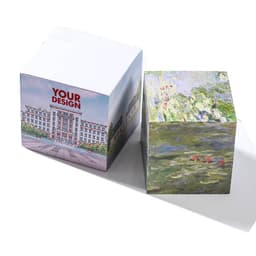A custom sticky note cube featuring a design with colourful artwork on one side and a blank, white side.