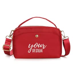 A red nylon crossbody bag with a zip closure, featuring a branded logo and an adjustable strap.