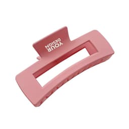 A pink plastic square hair claw clip with a branding logo. It features a rectangular design with a textured grip.