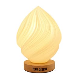 A personalized bedside table lamp in a soft yellow hue with a swirled design on a wooden base. It features branding.