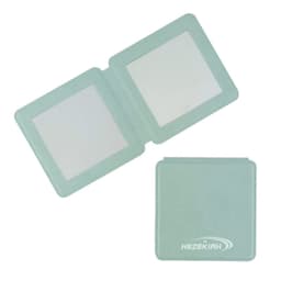 A mint green magnetic mini travel makeup mirror with dual reflective sides. It has a branding logo on the surface.