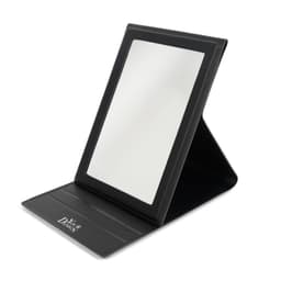 A foldable portable makeup mirror with a black frame, featuring a stand for stability. It has a logo on the base.