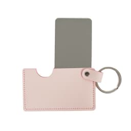 A pink PU leather holder with a rotating mirror and a keyring attached.
