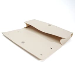 A beige spectacle case with a mirror inside, featuring snap closures and a simple design.