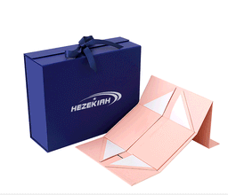 A collapsible gift packaging box in navy blue and pink, featuring a logo and a ribbon.