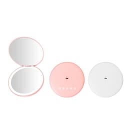 A folding vanity compact mirror with light in pink and white, featuring a logo on the front of the pink case.