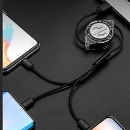 A retractable multi charging cord in black, connecting multiple devices with various charging ends, along with a logo.