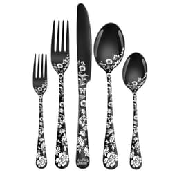A stainless steel flatware set with a decorative black and floral design, including forks, spoons, and a knife.