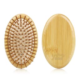 A bamboo massage comb with wooden bristles, featuring a smooth surface and oval design. Includes branding on one side.