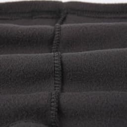 A black multifunctional neck gaiter with visible stitching details. It has a soft, textured fabric.