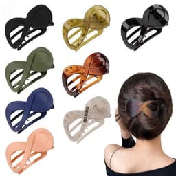 A collection of custom hair clips in various colours, including black, brown, green, and peach, displayed on a model.