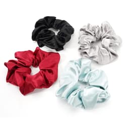 Four satin scrunchies in black, silver, red, and light blue, arranged together with a branding logo visible.