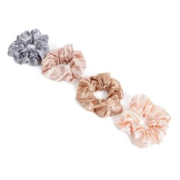 Four satin hair scrunchies in silver, beige, cream, and blush pink arranged in a row, featuring a logo.