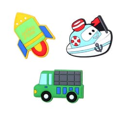 Three colourful fridge magnets featuring a rocket, a boat, and a green truck, each with unique shapes and designs.