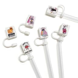A set of custom silicone straw cover caps in various designs, featuring vibrant colours and playful graphics, with white straws.