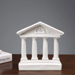 A white resin 3D model ornament depicting a classical building with columns and a pediment.