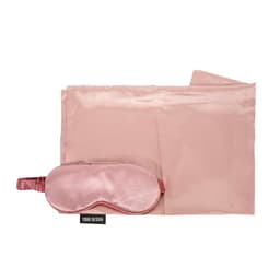 A satin pillowcase and matching sleep mask in soft pink, featuring a logo and a smooth finish.