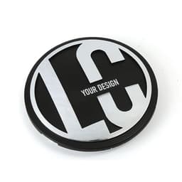 A round, black car emblem with a silver logo and space for personalised design.