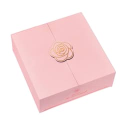 A pink gift box with a gold rose design, perfect for a custom wedding gift.