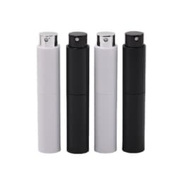 A set of four portable twist spray perfume bottles in white, black, and metallic finishes, featuring a logo.