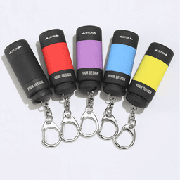 A collection of five LED rechargeable flashlight keychains in black, red, purple, blue, and yellow, featuring attachment clips.