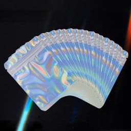 A set of laser holographic plastic ziplock bags in various positions, featuring a shiny, iridescent surface.