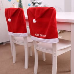 Red Santa hat chair covers with white trim, designed to fit over dining chairs, featuring a customizable area.