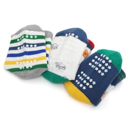 A set of custom kids' socks featuring various colourful patterns, including stripes and playful designs, with a logo on them.