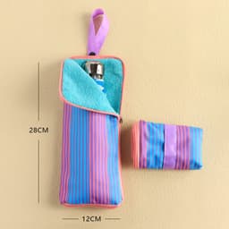 A waterproof storage pouch in vibrant blue and pink stripes, featuring a zip closure and a hanging loop.