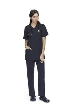 A unisex scrub top in navy blue, featuring a V-neck and pocket, worn with matching navy pants and a stethoscope.