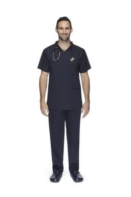 A man wearing navy unisex scrubs pants and a matching top, with a stethoscope around his neck.