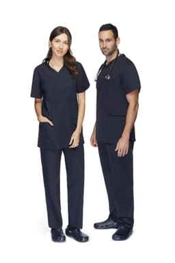 Unisex navy scrubs pants with a relaxed fit, displayed on male and female models, featuring pockets and a logo.