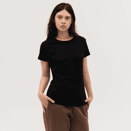 A black women's tee with a round neckline and short sleeves, modelled by a woman with long hair.