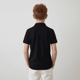 A black youth polo shirt viewed from the back. The shirt features short sleeves and a collar.