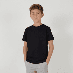 A youth essential tee in black, featuring a classic crew neck design. The model is standing with hands in pockets.