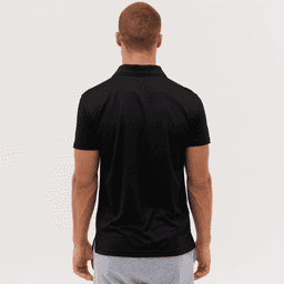 A black polo shirt is displayed, featuring a logo, viewed from the back on a model.