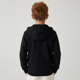 A zip-up hooded sweatshirt in black, displayed from the back on a child model. It features a hood.