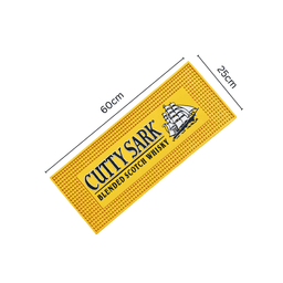 A yellow moulded PVC bar mat featuring a ship design and a logo. Dimensions are 60cm by 25cm.
