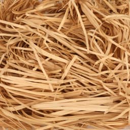 A collection of crinkled, light brown paper shreds, commonly used as filler material.