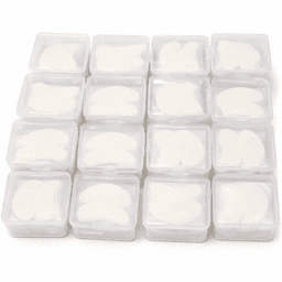 A collection of clear containers, each filled with white, curved gel pads arranged in a grid pattern.