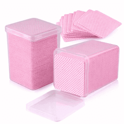 Two clear containers filled with pink wax strips, with a few strips laid out on top.