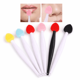 A set of seven silicone facial cleansers in various colours, including red, pink, blue, and yellow, with white handles.