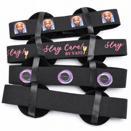 A set of hair bands in black with colourful designs and logos, featuring the phrases "Slay Care" and "Slay."