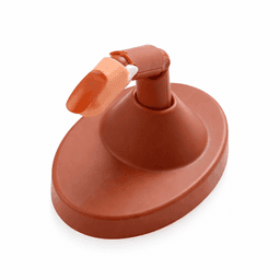 A drink bottle lid in orange and brown, featuring a spout and an attached cap, with a circular base.