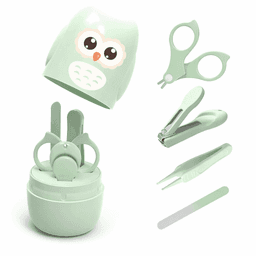 A mint green grooming set featuring an owl-themed container, scissors, nail clippers, tweezers, and a nail file.