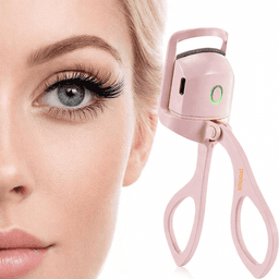 A pink eyelash curler alongside a close-up of a person's eye with voluminous lashes. The curler features a branding logo.