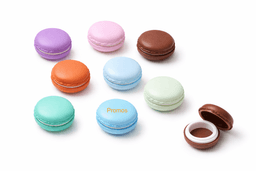 A set of colourful macaron-shaped containers in purple, pink, blue, green, and brown. Each has a removable lid.